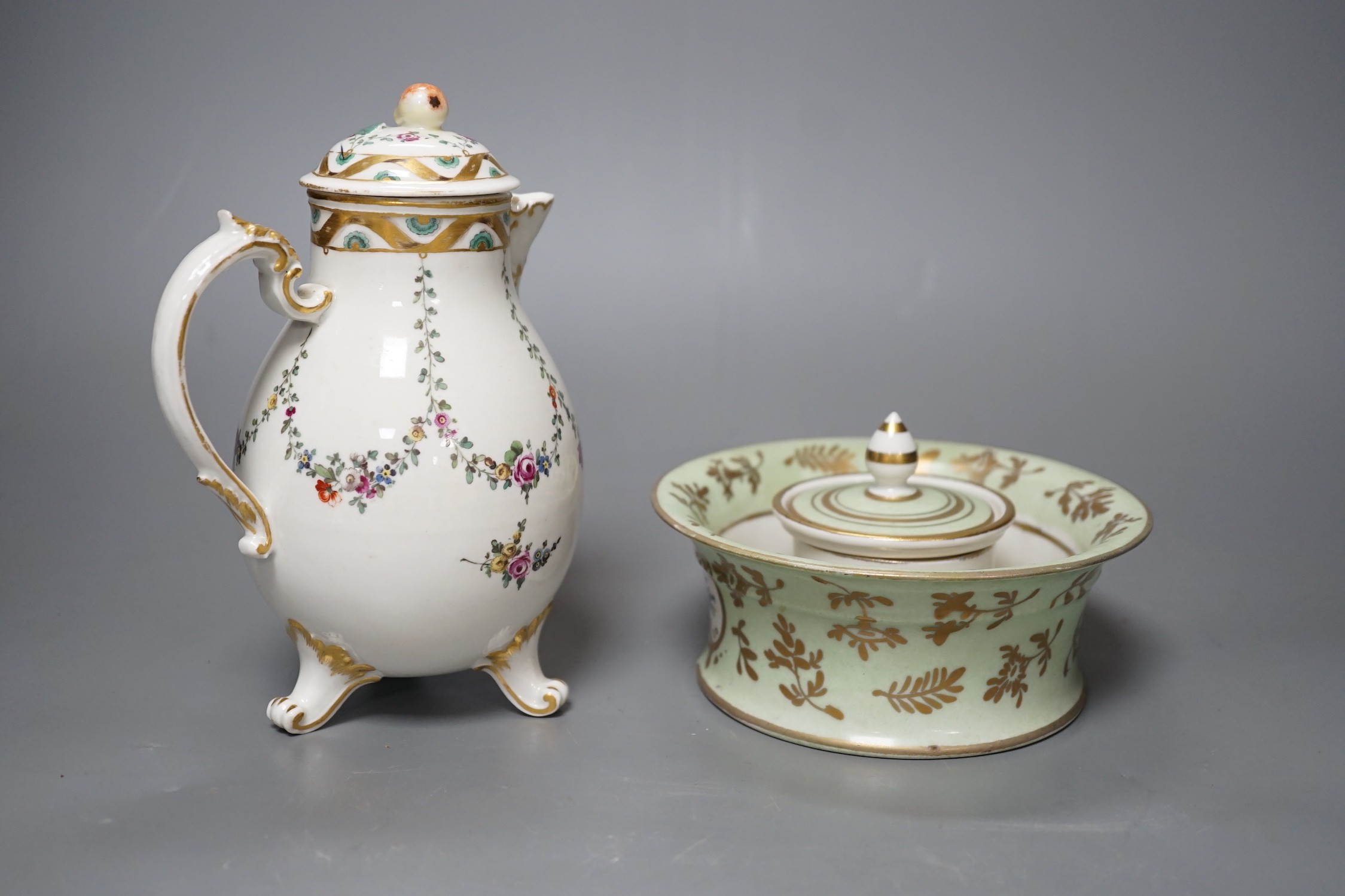 A Ludwigsburg three footed jug and cover painted with swags of flower c. 1770 and a 19th century French porcelain inkwell and cover a colourful gilt floral panel, jug and cover 17 cms high